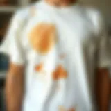 Stains on White Tees: A Closer Look Charming display of a pristine white t-shirt with a tea stain